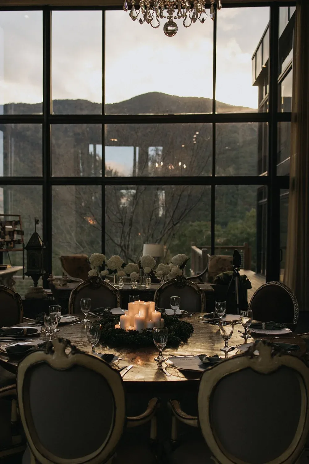 Candlelit table setting at The Redstone Estate with mountain views